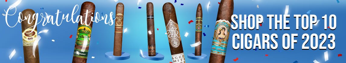 Multiple upright cigars with confetti on blue background